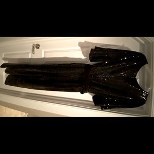 Black sequin jumpsuit with velvet sash